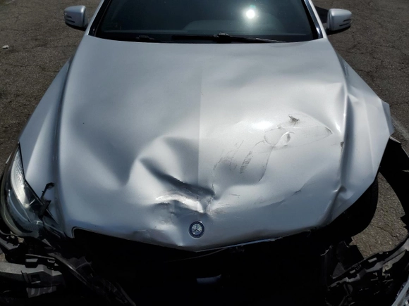 2014 Mercedes-Benz E 350 z VIN WDDKJ5KB3EF257147, wystawiony jako Copart lot #58839015 z przebiegiem 110 024 mil mil oraz Szkoda całkowita • Salvage title. Historia ofert i sprzedaży dostępna na DreamBid. Obrazek 11.