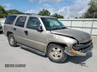 2002 Chevrolet Tahoe LS z VIN 1GNEC13V92R136479, wystawiony jako Copart lot #59803055 z przebiegiem 165 718 mil mil oraz Czysty tytuł • Clean title. Historia ofert i sprzedaży dostępna na DreamBid. Obrazek 4.