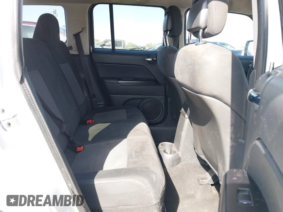 2011 Jeep Patriot Latitude with VIN 1J4NT1GB5BD245263, listed as a IAAI auction lot 41942376 with 215,147 mi miles. Bid and sale history available at carsss.com. Image 8.