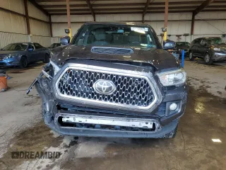 2019 Toyota Tacoma SR z VIN 3TMCZ5AN8KM197011, wystawiony jako Copart lot #56198675 z przebiegiem 117 363 mil mil oraz Szkoda całkowita • Salvage title. Historia ofert i sprzedaży dostępna na DreamBid. Obrazek 5.
