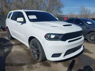 2018 Dodge Durango SRT with VIN 1C4SDJGJXJC395094, listed as a IAAI auction lot 41857351 with 90,106 mi miles and . Bid and sale history available at carsss.com. Image 1.