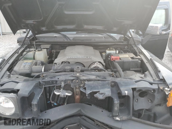 2009 Hummer H3 with VIN 5GNEN13L198138745, listed as a Copart auction lot 63202914 with 168,076 mi miles and Salvage Title. Bid and sale history available at DreamBid. Image 11.