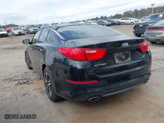 2014 Kia Optima LX with VIN 5XXGM4A74EG338058, listed as a IAAI auction lot 41723390 with 155,840 mi miles. Bid and sale history available at carsss.com. Image 3.