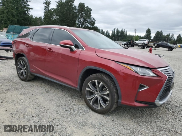2018 Lexus RX 450hL Premium with VIN JTJDGKCA5J2002701, listed as a Copart auction lot 60258935 with 73,437 mi miles and Salvage title. Bid and sale history available at DreamBid. Image 4.