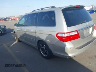 2005 Honda Odyssey TOURING with VIN 5FNRL38875B004209, listed as a IAAI auction lot 42003057 with 242,794 mi miles. Bid and sale history available at carsss.com. Image 3.