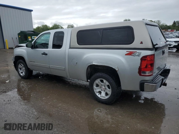 2011 GMC Sierra 1500 SLE z VIN 1GTR2VE38BZ165813, wystawiony jako Copart lot #57884825 z przebiegiem 112 027 mil mil oraz Szkoda całkowita • Salvage title. Historia ofert i sprzedaży dostępna na DreamBid. Obrazek 2.