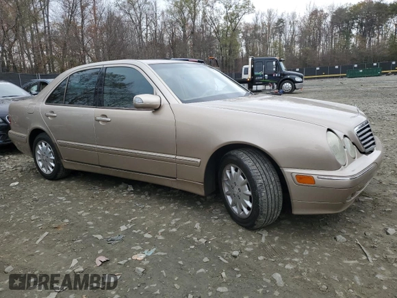 2001 Mercedes-Benz E-Class AWD with VIN WDBJF82J31X054634, listed as a Copart auction lot 81686174 with 139,746 mi miles and Salvage Title. Bid and sale history available at carsss.com. Image 4.