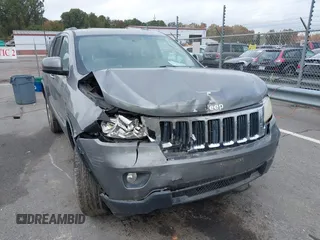 2012 Jeep Grand Cherokee Laredo with VIN 1C4RJFAG8CC298268, listed as a IAAI auction lot 40787833 with 206,486 mi miles. Bid and sale history available at carsss.com. Image 6.