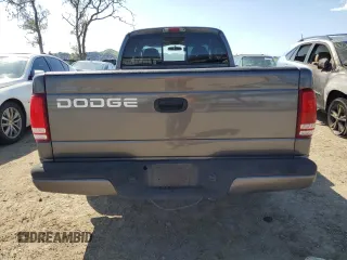 2002 Dodge Dakota z VIN 1B7GL32N62S551525, wystawiony jako Copart lot #48777025 z przebiegiem 91 438 mil mil oraz Czysty tytuł • Clean title. Historia ofert i sprzedaży dostępna na DreamBid. Obrazek 6.
