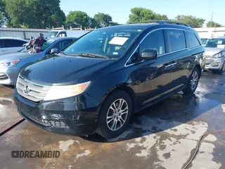 2013 Honda Odyssey EX-L with VIN 5FNRL5H6XDB090768, listed as a IAAI auction lot 42008759 with 116,052 mi miles and . Bid and sale history available at carsss.com. Image 21.