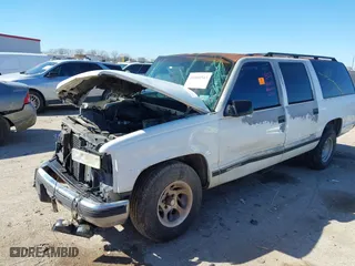 1996 GMC Suburban with VIN 1GDEC16R8TJ738647, listed as a IAAI auction lot 41688543 with 216,078 mi miles. Bid and sale history available at carsss.com. Image 2.