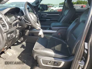 2021 Ram 1500 Laramie with VIN 1C6SRFJT3MN677537, listed as a Copart auction lot 57936295 with Not provided miles and Salvage title. Bid and sale history available at DreamBid. Image 7.