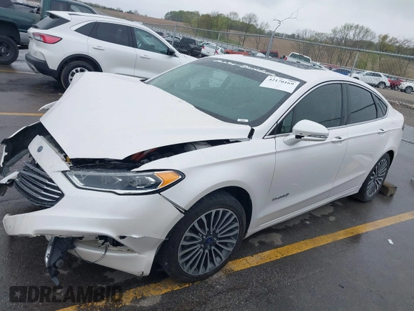 2017 Ford Fusion Hybrid Titanium с VIN 3FA6P0RUXHR317572, выставлен на аукционе IAAI как лот 42170169 с пробегом 138 987 миль миль и . История ставок и продаж доступна на DreamBid. Изображение 17.