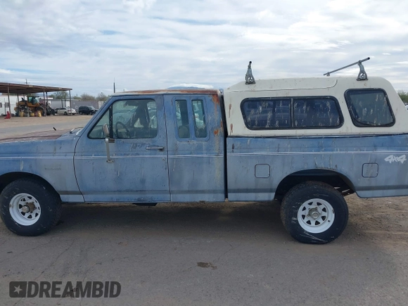 1991 Ford F-150 with VIN 1FTEX14Y8MKA33233, listed as a IAAI auction lot 41572967 with 44,300 mi miles. Bid and sale history available at carsss.com. Image 6.