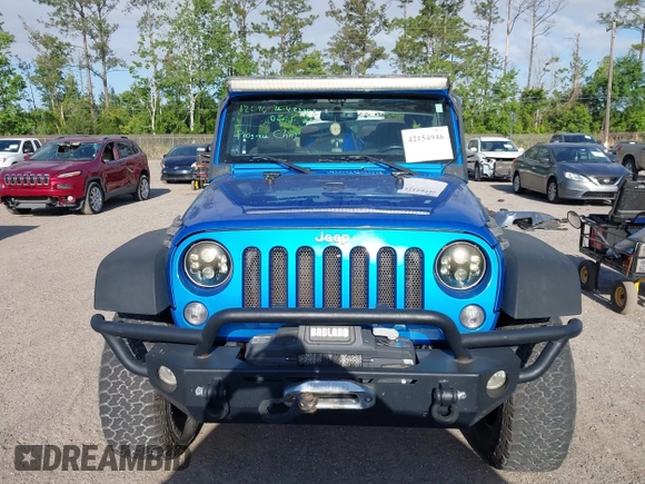 2015 Jeep Wrangler Sport z VIN 1C4AJWAG8FL550859, wystawiony jako IAAI lot #42154946 z przebiegiem 143 658 mil mil oraz . Historia ofert i sprzedaży dostępna na DreamBid. Obrazek 13.