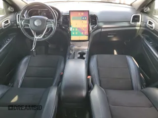 2020 Jeep Grand Cherokee Laredo E with VIN 1C4RJFAG4LC225205, listed as a Copart auction lot 55650525 with 93,459 mi miles and Salvage title. Bid and sale history available at DreamBid. Image 8.