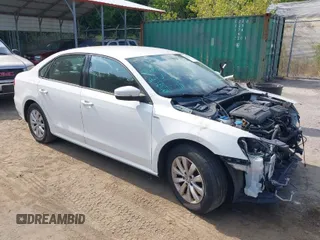 2015 Volkswagen Passat 1.8T Wolfsburg Ed with VIN 1VWAT7A39FC006249, listed as a IAAI auction lot 40204853 with 137,392 mi miles. Bid and sale history available at carsss.com. Image 1.