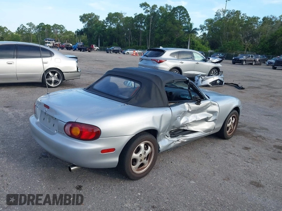 1999 Mazda MX-5 Miata with VIN JM1NB3534X0124237, listed as a IAAI auction lot 42536654 with 92,696 mi miles and . Bid and sale history available at DreamBid. Image 6.