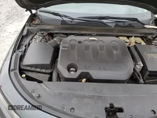 2018 Chevrolet Impala Premier z VIN 2G1125S32J9145687, wystawiony jako Copart lot #84465785 z przebiegiem 93 621 mil mil oraz Szkoda całkowita • Salvage title. Historia ofert i sprzedaży dostępna na DreamBid. Obrazek 13.