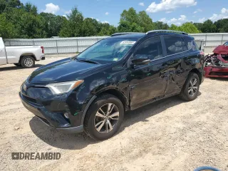 2018 Toyota RAV4 XLE with VIN 2T3WFREV8JW407272, listed as a Copart auction lot 63694885 with 117,424 mi miles and Salvage title. Bid and sale history available at DreamBid. Image 1.