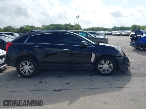 2014 Cadillac SRX Luxury Collection with VIN 3GYFNBE36ES587292, listed as a IAAI auction lot 41944420 with 150,136 mi miles and . Bid and sale history available at DreamBid. Image 13.