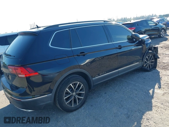 2020 Volkswagen Tiguan SE z VIN 3VV3B7AX1LM019574, wystawiony jako IAAI lot #41450002 z przebiegiem 44 553 mil mil oraz . Historia ofert i sprzedaży dostępna na DreamBid. Obrazek 4.