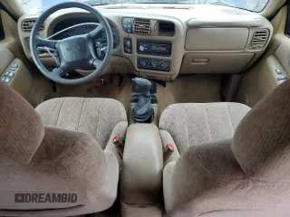 1999 GMC Jimmy SLE with VIN 1GKDT13W8X2545509, listed as a Copart auction lot 81608944 with 130,881 mi miles and Salvage Title. Bid and sale history available at carsss.com. Image 8.