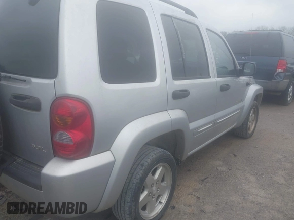 2003 Jeep Liberty Limited with VIN 1J4GL58K73W592677, listed as a IAAI auction lot 41394407 with 1 mi miles. Bid and sale history available at carsss.com. Image 4.