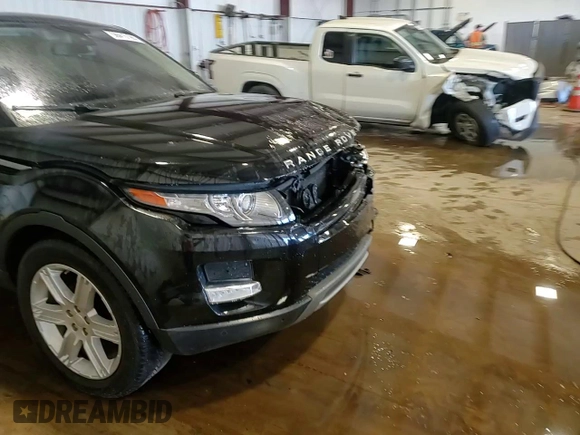 2015 Land Rover Range Rover Evoque Pure Premium with VIN SALVR2BG7FH013901, listed as a Copart auction lot 56415195 with 176,920 mi miles and Salvage title. Bid and sale history available at DreamBid. Image 15.