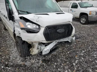 2021 Ford Transit Cargo with VIN 1FTBW3X89MKA74340, listed as a Copart auction lot 82188434 with 23,360 mi miles and Salvage Title. Bid and sale history available at carsss.com. Image 9.