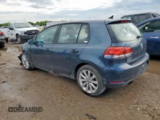 2014 Volkswagen Golf TDI w/Sunroof & Nav с VIN WVWDM7AJ2EW000544, выставлен на аукционе Copart как лот 59343995 с пробегом 128 421 миль миль и Списание • Salvage title. История ставок и продаж доступна на DreamBid. Изображение 2.