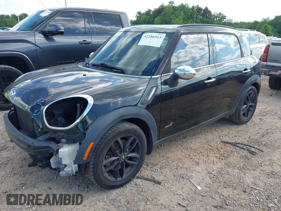 2013 MINI Countryman S ALL4 with VIN WMWZC5C57DWM15738, listed as a IAAI auction lot 42286913 with 175,299 mi miles and . Bid and sale history available at DreamBid. Image 2.