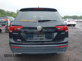 2021 Volkswagen Tiguan S z VIN 3VV0B7AX3MM031908, wystawiony jako IAAI lot #42504384 z przebiegiem 42 510 mil mil oraz . Historia ofert i sprzedaży dostępna na DreamBid. Obrazek 16.