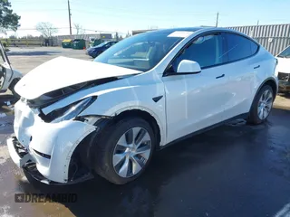 2022 Tesla Model Y Long Range with VIN 7SAYGDEE1NF402745, listed as a IAAI auction lot 41493850 with 11,222 mi miles and . Bid and sale history available at DreamBid. Image 19.