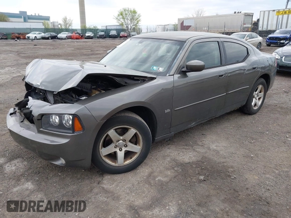 2010 Dodge Charger SXT with VIN 2B3CA3CV7AH165769, listed as a IAAI auction lot 42038135 with 200,886 mi miles. Bid and sale history available at carsss.com. Image 2.
