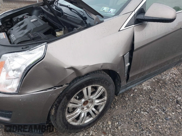 2011 Cadillac SRX Luxury Collection with VIN 3GYFNAEY9BS571833, listed as a IAAI auction lot 41983443 with 183,761 mi miles. Bid and sale history available at carsss.com. Image 6.