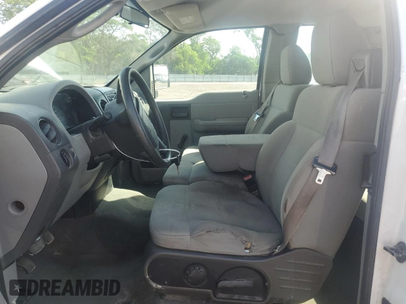 2007 Ford F-150 STX with VIN 1FTRX12W47FB00233, listed as a Copart auction lot 61870565 with 205,846 mi miles and Clean title. Bid and sale history available at DreamBid. Image 7.