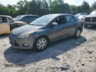 2012 Ford Focus SE with VIN 1FAHP3F21CL183104, listed as a Copart auction lot 60533905 with 199,869 mi miles and Clean title. Bid and sale history available at DreamBid. Image 1.