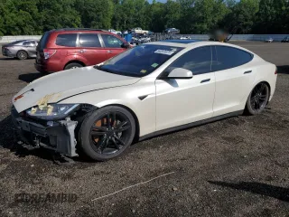 2013 Tesla Model S с VIN 5YJSA1CG2DFP25370, выставлен на аукционе Copart как лот 64003825 с пробегом 85 656 миль миль и Списание • Salvage title. История ставок и продаж доступна на DreamBid. Изображение 1.