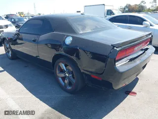 2013 Dodge Challenger SXT with VIN 2C3CDYAG9DH708717, listed as a IAAI auction lot 41990705 with 92,784 mi miles. Bid and sale history available at carsss.com. Image 3.