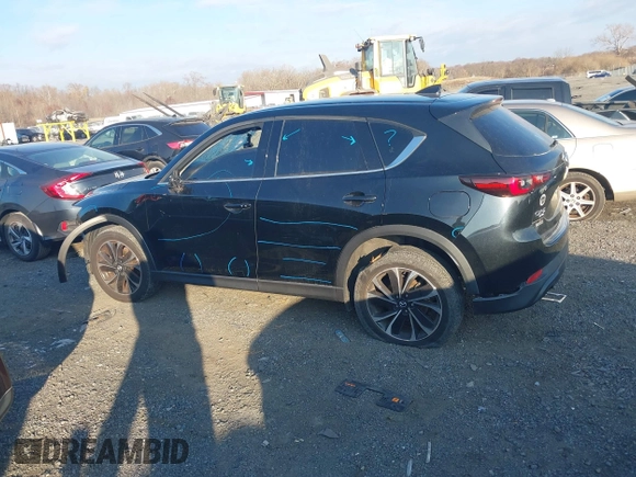 2022 Mazda CX-5 2.5 S Premium Package with VIN JM3KFBDM1N1537243, listed as a IAAI auction lot 40871911 with 77,725 mi miles. Bid and sale history available at carsss.com. Image 14.