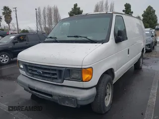 2004 Ford Econoline Cargo with VIN 1FTRE14W44HA43969, listed as a IAAI auction lot 41488289 with 268,097 mi miles. Bid and sale history available at carsss.com. Image 6.
