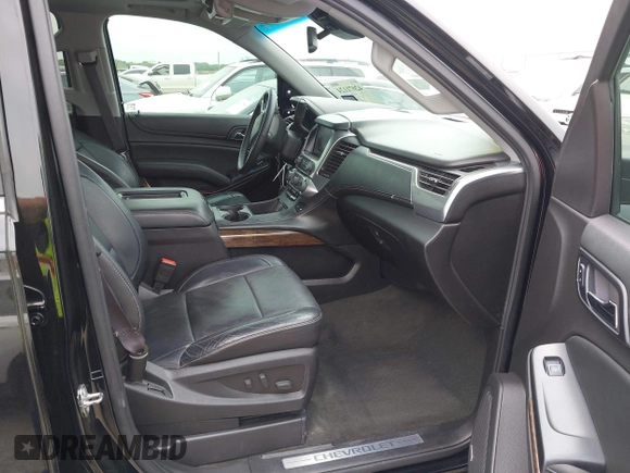 2015 Chevrolet Suburban LT with VIN 1GNSCJKC1FR304656, listed as a IAAI auction lot 42071124 with 133,140 mi miles. Bid and sale history available at carsss.com. Image 5.