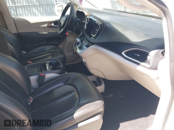 2017 Chrysler Pacifica Touring L with VIN 2C4RC1BG0HR821230, listed as a IAAI auction lot 42158120 with 98,354 mi miles and . Bid and sale history available at DreamBid. Image 5.