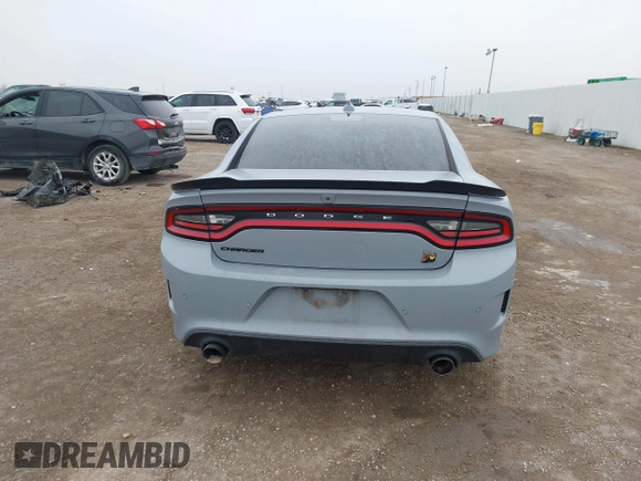 2020 Dodge Charger Scat Pack Widebody z VIN 2C3CDXGJ8LH216563, wystawiony jako IAAI lot #41502637 z przebiegiem Nie podano mil oraz . Historia ofert i sprzedaży dostępna na DreamBid. Obrazek 16.