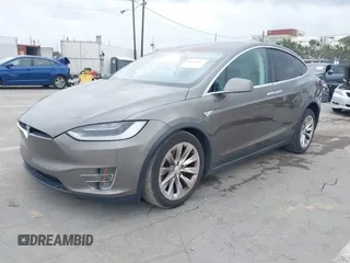 2016 Tesla Model X 70D with VIN 5YJXCBE22GF017499, listed as a IAAI auction lot 42192962 with 103,430 mi miles and . Bid and sale history available at DreamBid. Image 2.