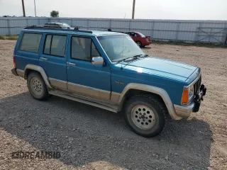 1993 Jeep Cherokee Country with VIN 1J4FJ78S8PL504126, listed as a Copart auction lot 70508464 with 153,163 mi miles and Clean Title. Bid and sale history available at carsss.com. Image 4.