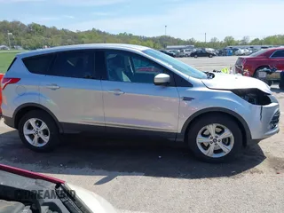 2016 Ford Escape SE with VIN 1FMCU9G98GUA10333, listed as a IAAI auction lot 42021490 with 128,973 mi miles. Bid and sale history available at carsss.com. Image 14.