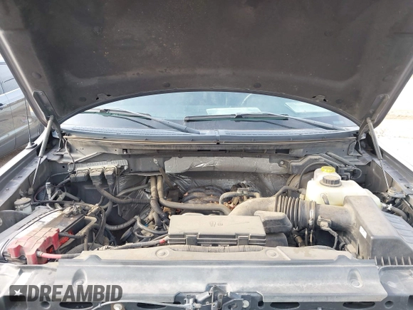 2014 Ford F-150 XL with VIN 1FTFW1EFXEKF21377, listed as a IAAI auction lot 42133053 with 99,924 mi miles and . Bid and sale history available at DreamBid. Image 10.