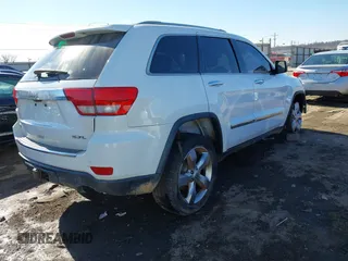 2013 Jeep Grand Cherokee Overland with VIN 1C4RJECT4DC526160, listed as a IAAI auction lot 41429164 with 115,311 mi miles. Bid and sale history available at carsss.com. Image 4.